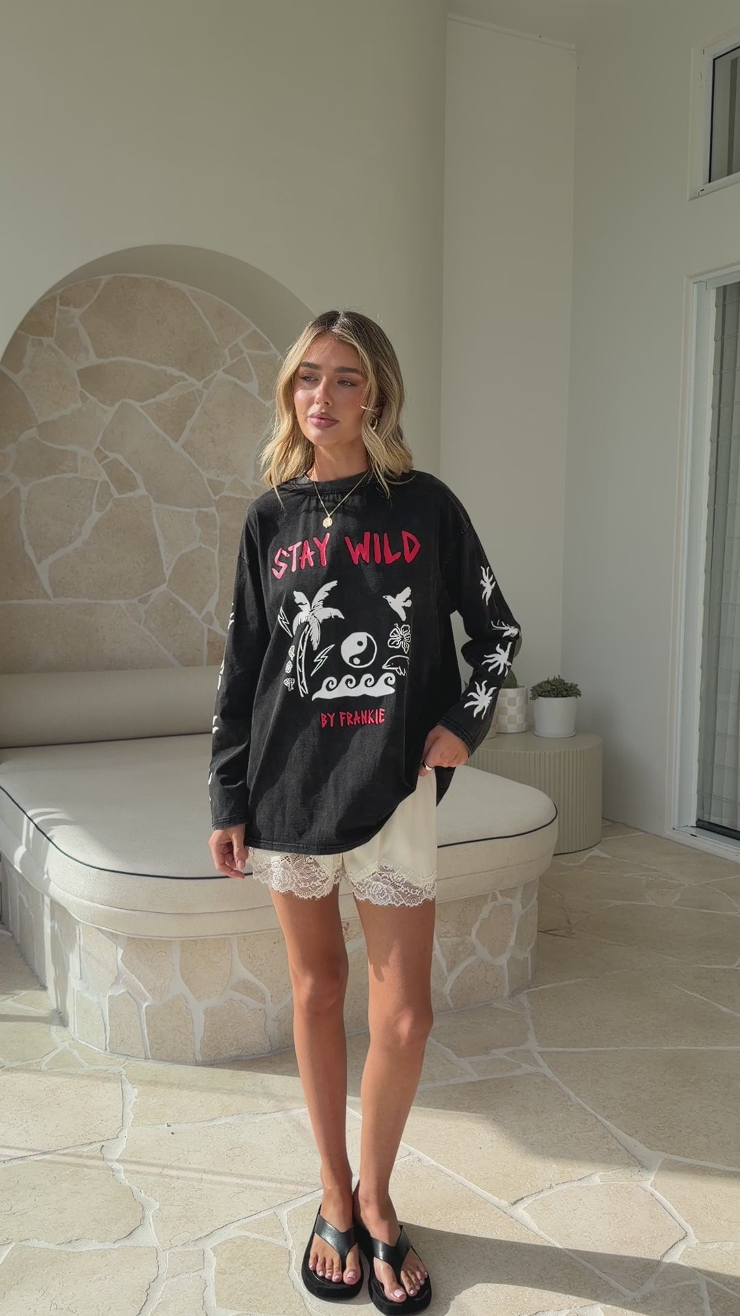 Load video: Stay Wild Long Sleeve Top - Black
