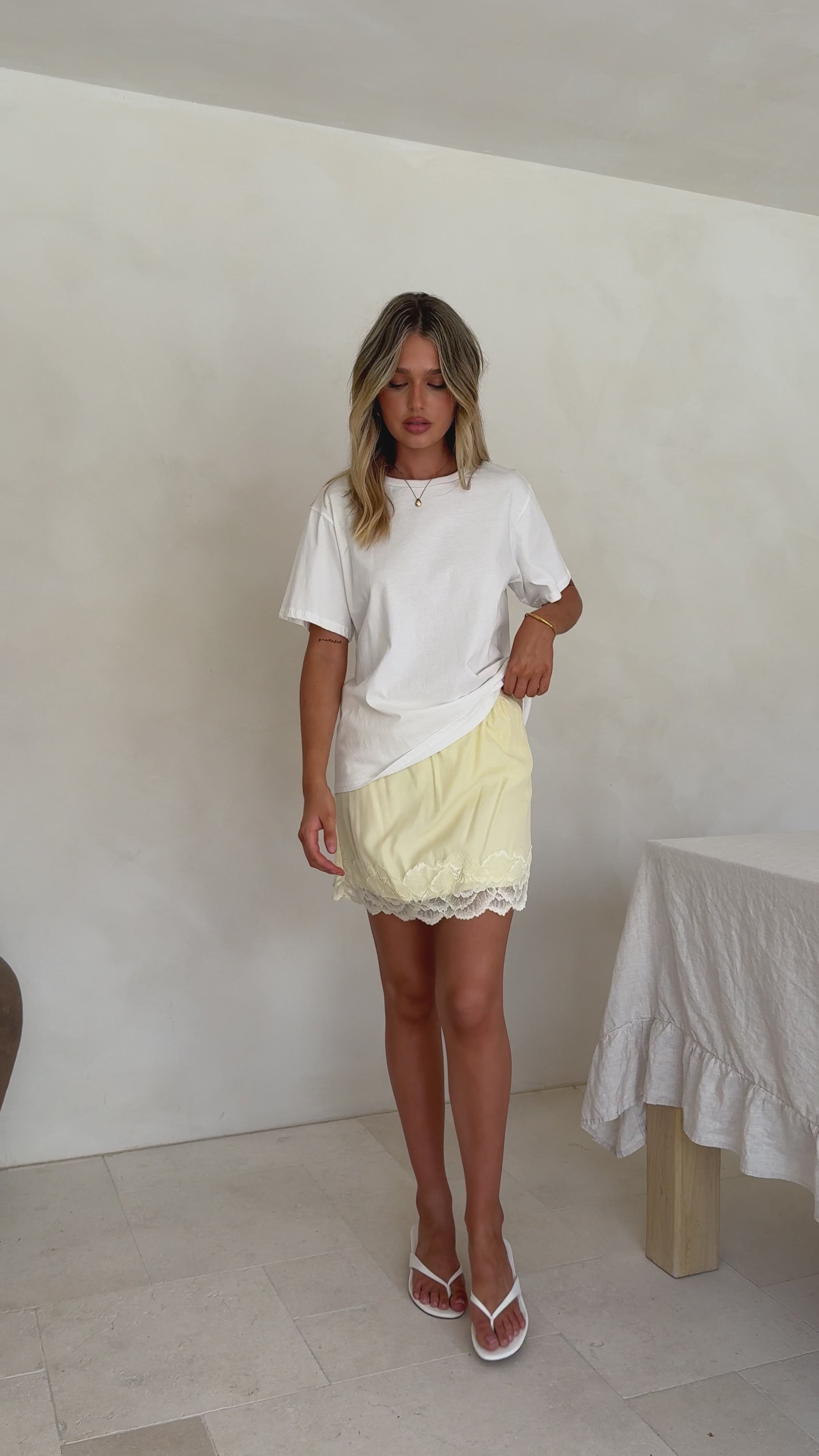 Load video: Davonne Lace Mini Skirt - Yellow - Billy J